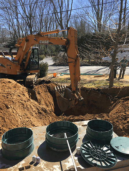 Backhoe Digs Hole