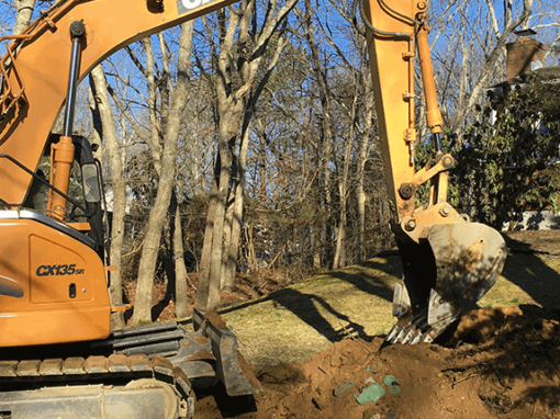 Backhoe Starts to Dig